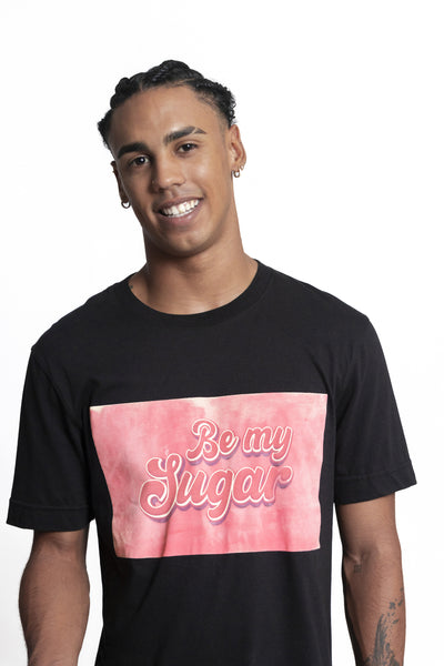 Express yourself with the "Be my Sugar" logo Tee. Versatile and comfortable, it's a perfect addition to your wardrobe, allowing you to make a statement effortlessly.