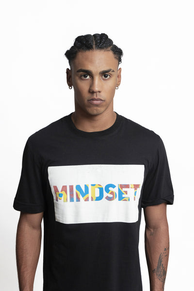 Embrace comfort with a soft Pima cotton T-shirt featuring a confident "MINDSET" logo for a stylish statement.Embrace comfort with a soft Pima cotton T-shirt featuring a confident "MINDSET" logo for a stylish statement.