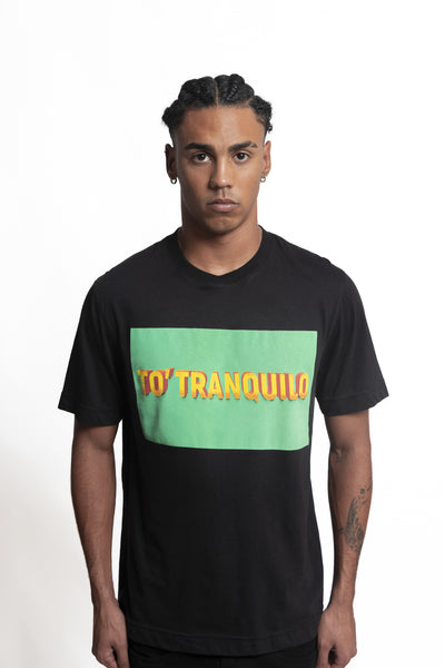 Make a statement with a T-shirt crafted from soft Pima cotton fabric, featuring a "To' Tranquilo" logo with Puerto Rican slang for a playful and comfortable style.
