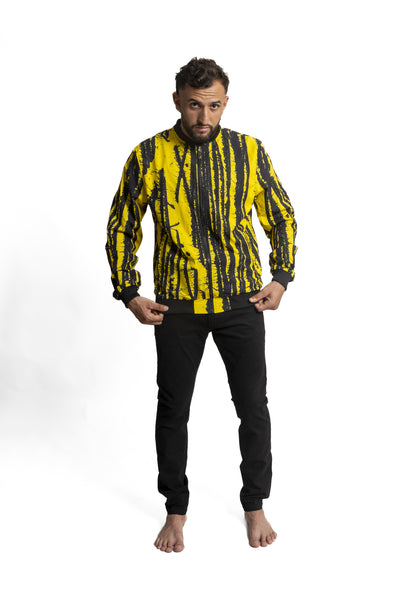 Elevate your style with the Sophisticated GHANA Artist Jacket. Experience low-bulk coziness, sophistication, and a unique print for distinctive elegance that sets you apart.