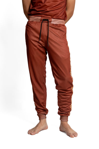 Elevate your urban style with BROWN GEOMETRY'S Cargo Pants: Comfortable, functional essentials for urban elegance and secure storage. Redefine your look today.